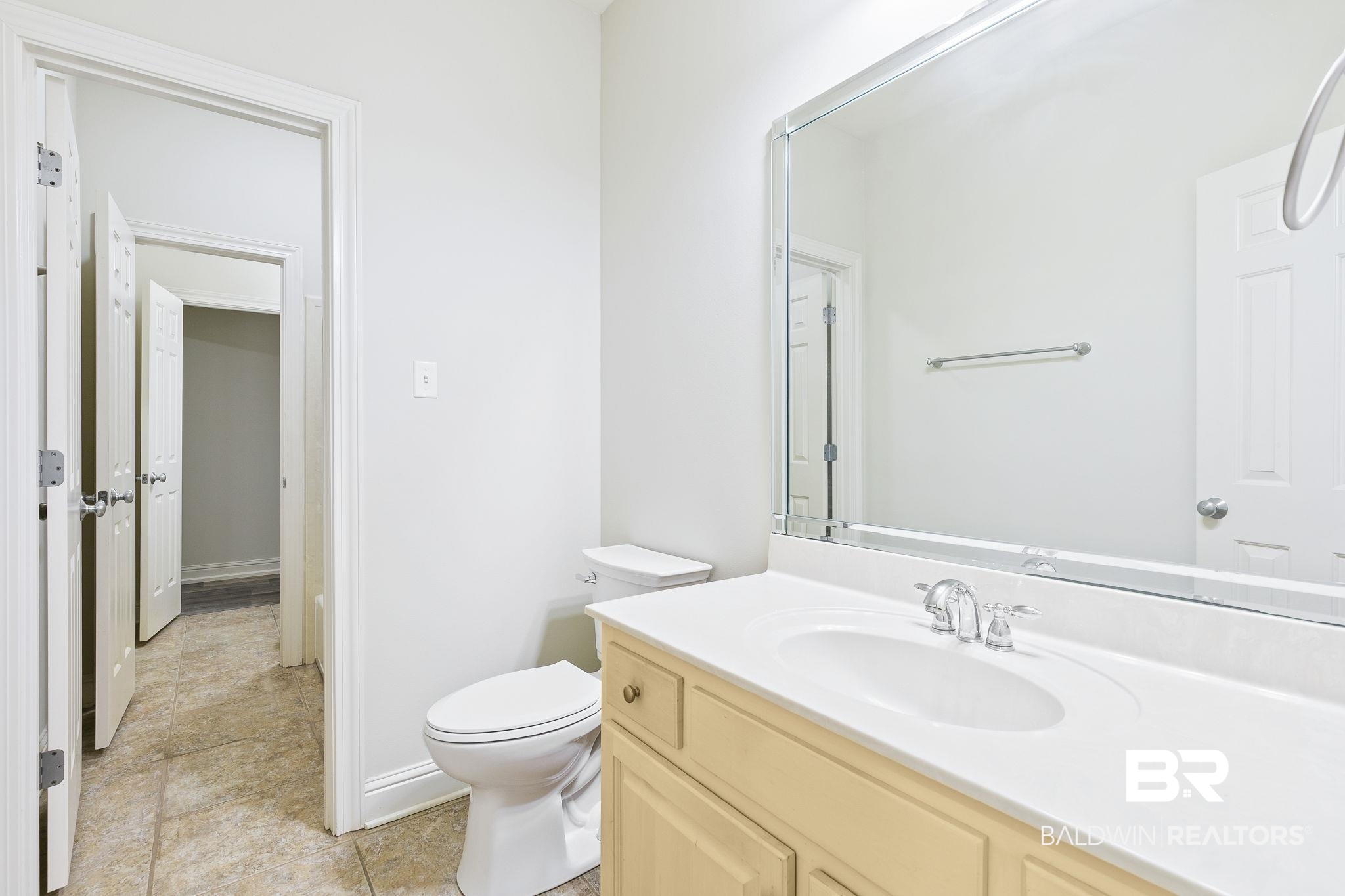13 Bugle Retreat Daphne, AL 36527 - Photo 24 of 40 Bathroom with tile patterned floors, vanity, and toilet