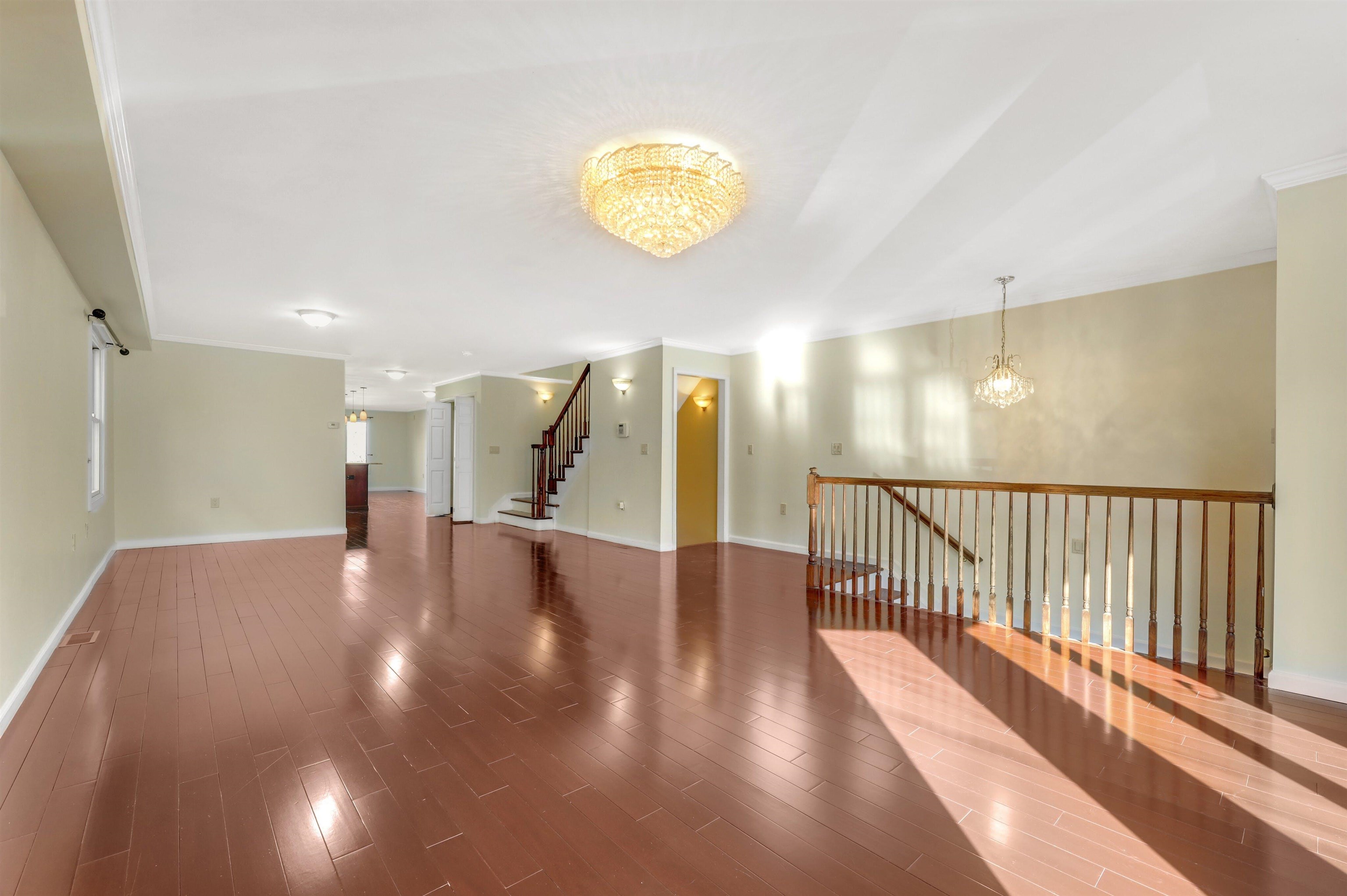 733 Chestnut Street, Unit A Secaucus, NJ 07094 - Photo 3 of 20 a view of a hallway with wooden floor