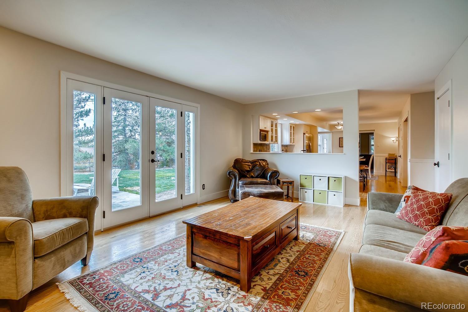 1894 La Quinta Circle Evergreen, CO 80439 - Photo 18 of 36 a living room with furniture and a rug
