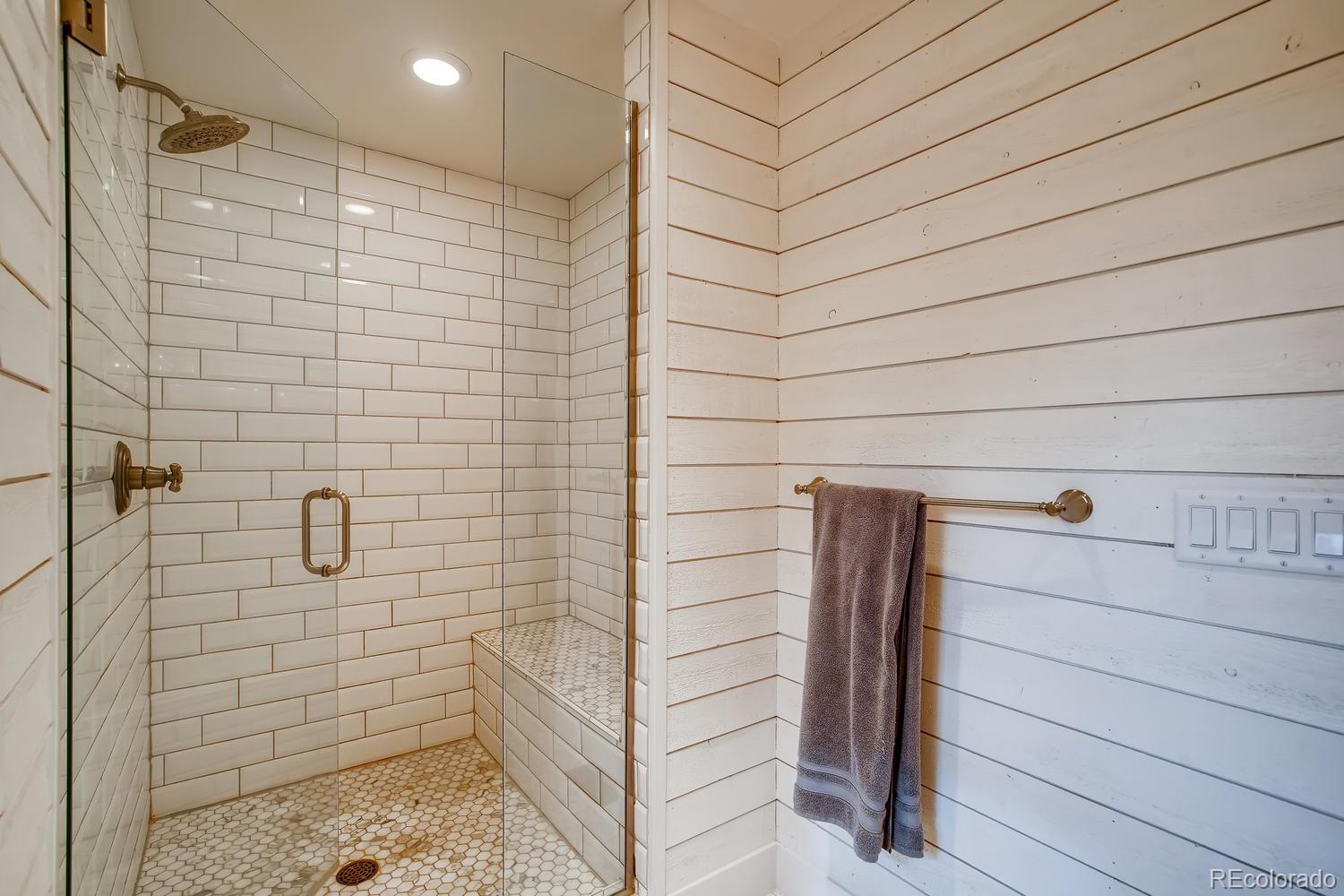 1894 La Quinta Circle Evergreen, CO 80439 - Photo 22 of 36 a bathroom with a shower