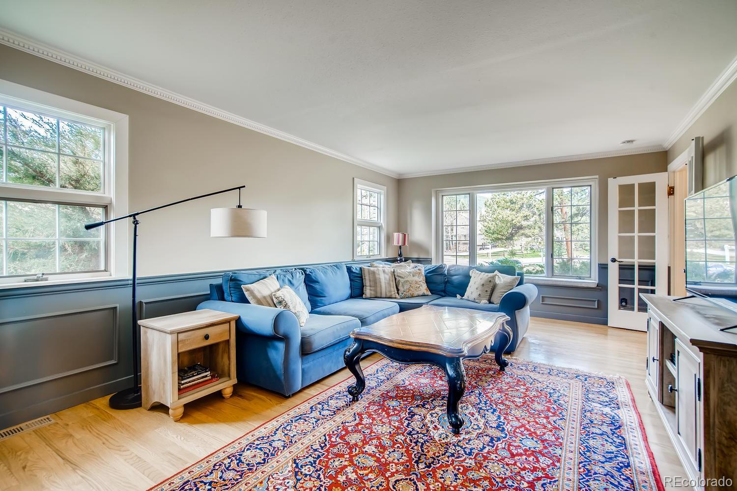 1894 La Quinta Circle Evergreen, CO 80439 - Photo 9 of 36 a living room with furniture and a window