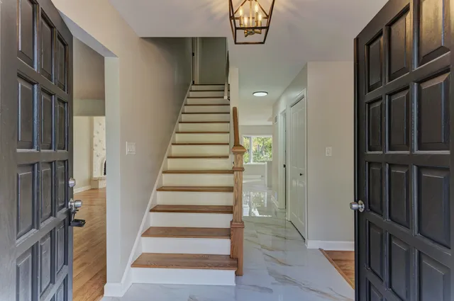 a view of an entryway with staircase