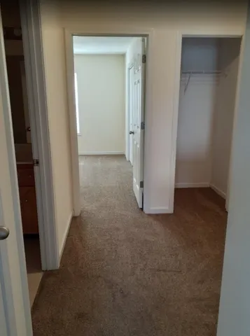 a view of a house with a door and a window