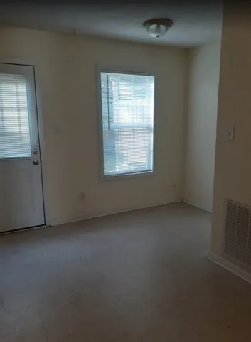 an empty room with a window