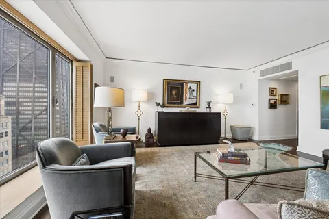 a living room with a couch and a flat screen tv