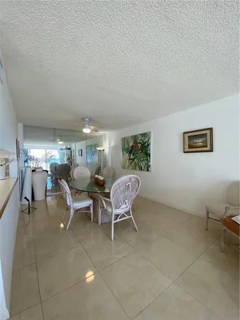 a outdoor space with a couch and chairs