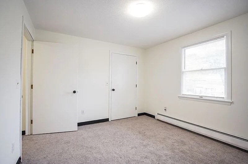 878-880 St James Avenue Springfield, MA 01104 - Photo 11 of 17 an empty room with windows