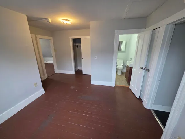 a bathroom with a tub and sink