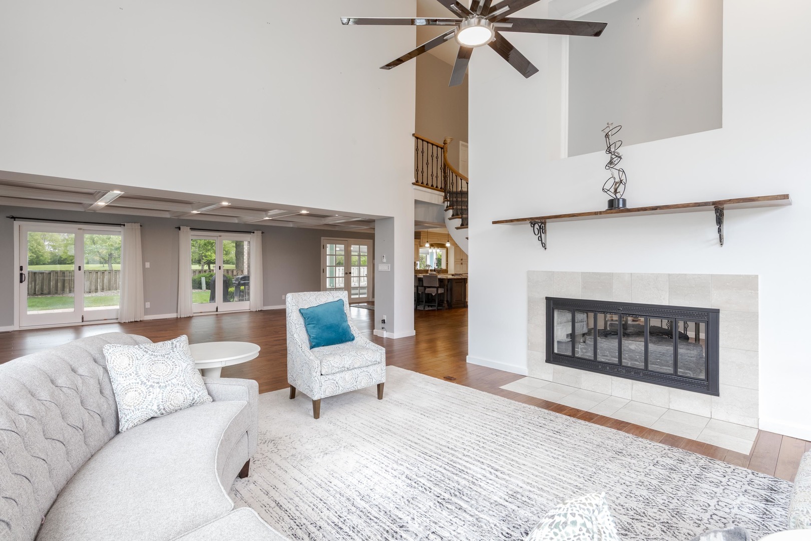 1810 Cardinal Court Pontiac, IL 61764 - Photo 11 of 88 a living room with furniture a fireplace and a large window