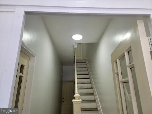 a view of entryway with stairs