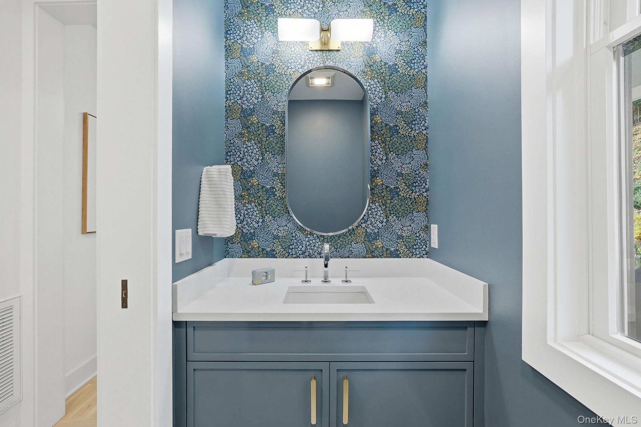 80 Grapal Street Rye, NY 10580 - Photo 15 of 38 a bathroom with a sink and a mirror