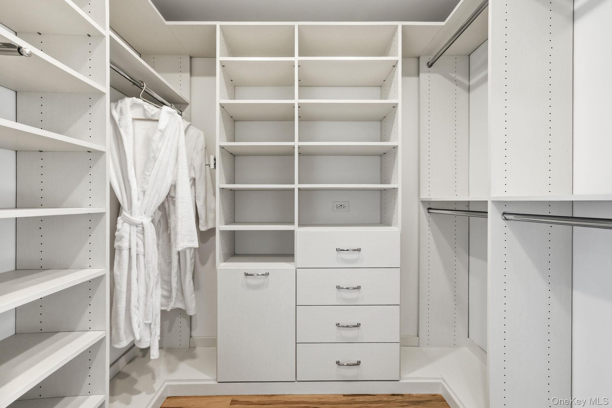 80 Grapal Street Rye, NY 10580 - Photo 19 of 38 a view of walk in closet with clothes