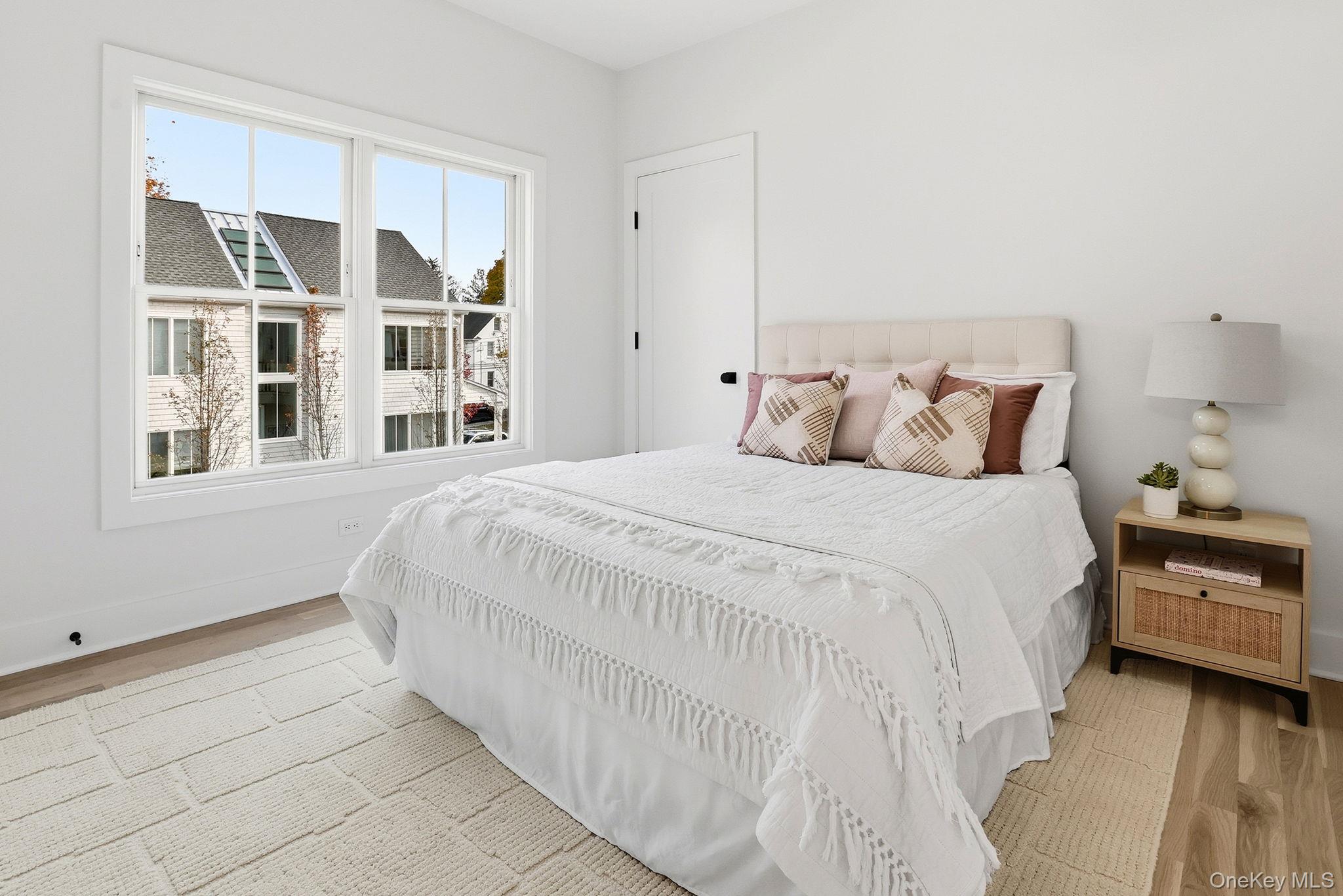 80 Grapal Street Rye, NY 10580 - Photo 24 of 38 a bedroom with a bed and a window