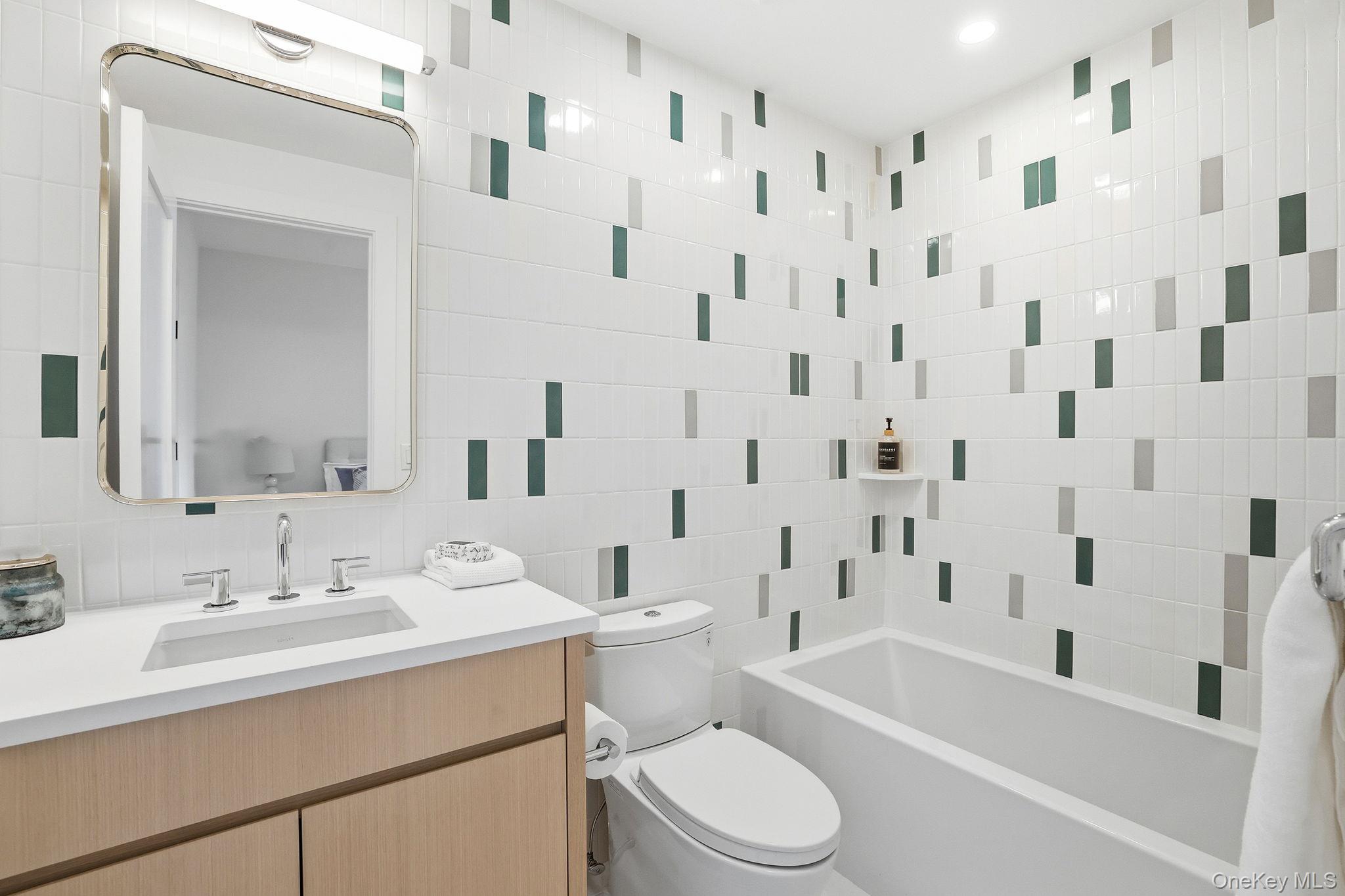 80 Grapal Street Rye, NY 10580 - Photo 25 of 38 a bathroom with a sink a toilet and a bathtub