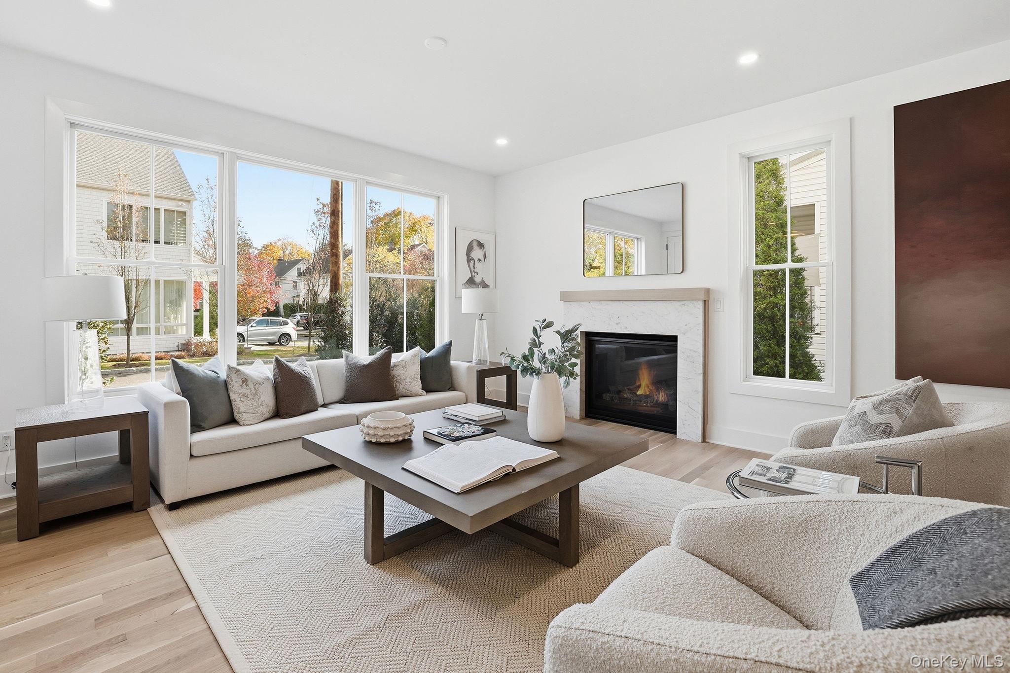 80 Grapal Street Rye, NY 10580 - Photo 3 of 38 a living room with furniture and a fireplace