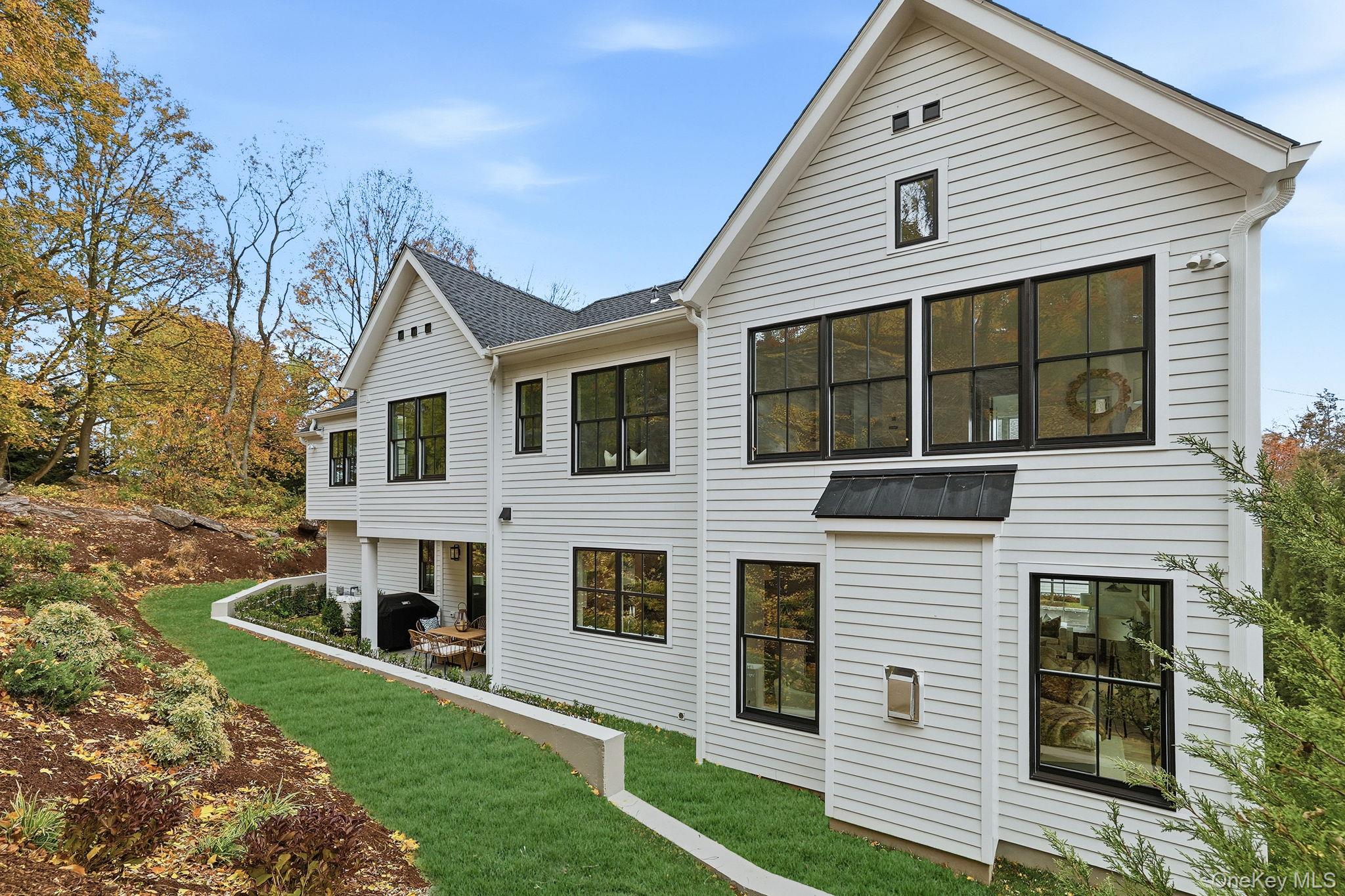 80 Grapal Street Rye, NY 10580 - Photo 36 of 38 a view of a house with a yard