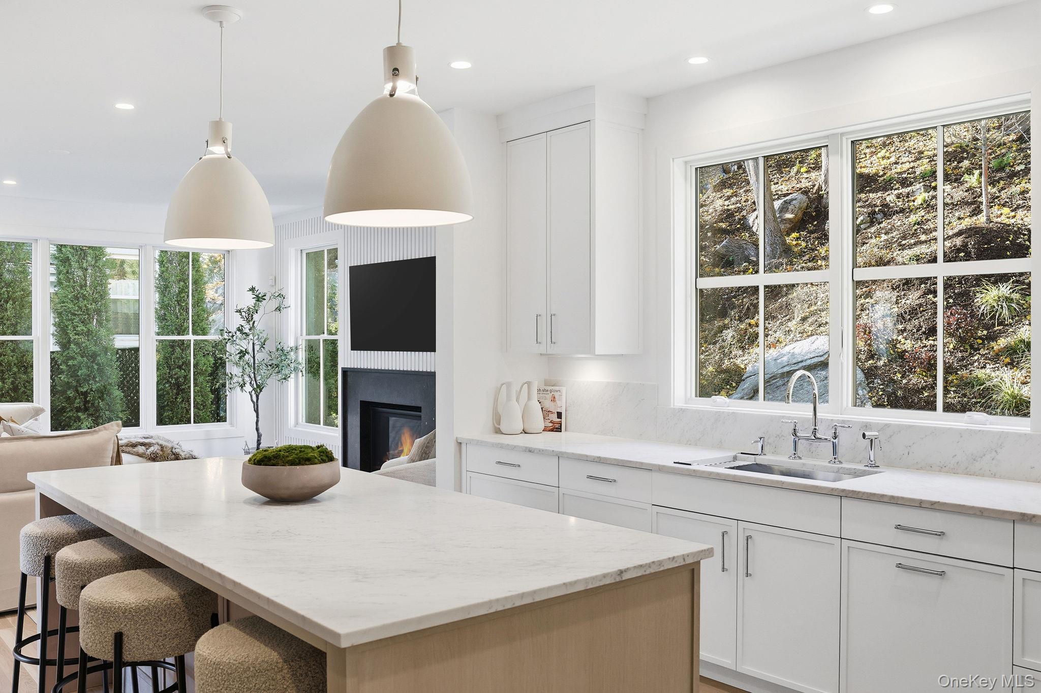 80 Grapal Street Rye, NY 10580 - Photo 6 of 38 a kitchen with a sink a large window and a wooden floor