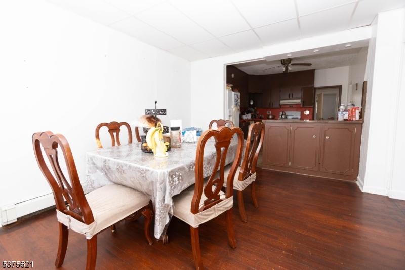 622 North 9th Street Newark, NJ 07107 - Photo 2 of 24 a dining room with furniture and wooden floor