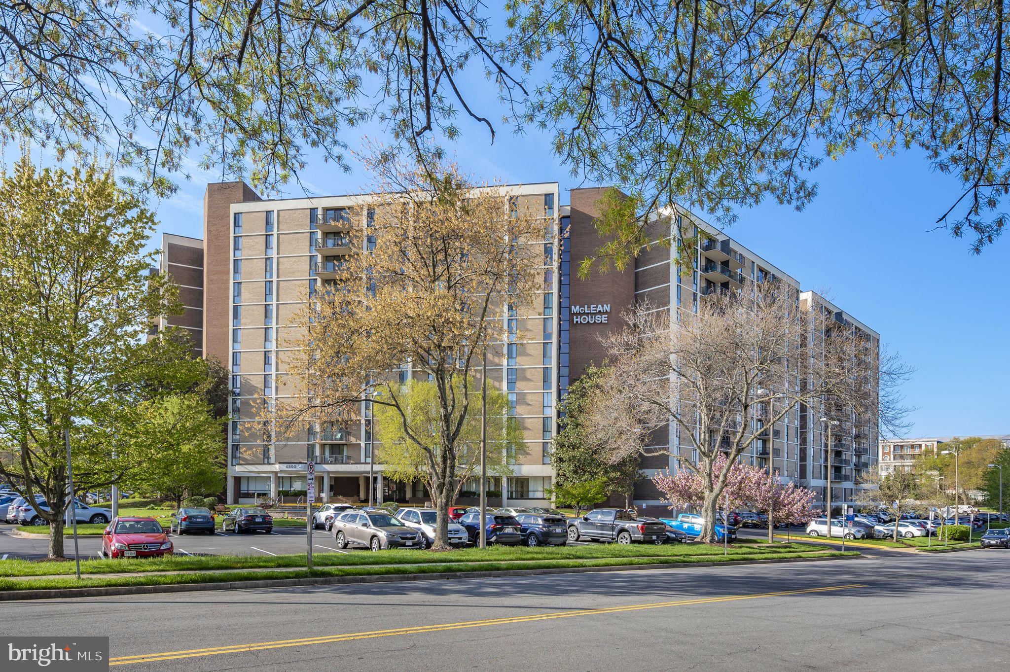 6800 Fleetwood Road, Unit 509 McLean, VA 22101 - Photo 41 of 48 front view of a building with large trees