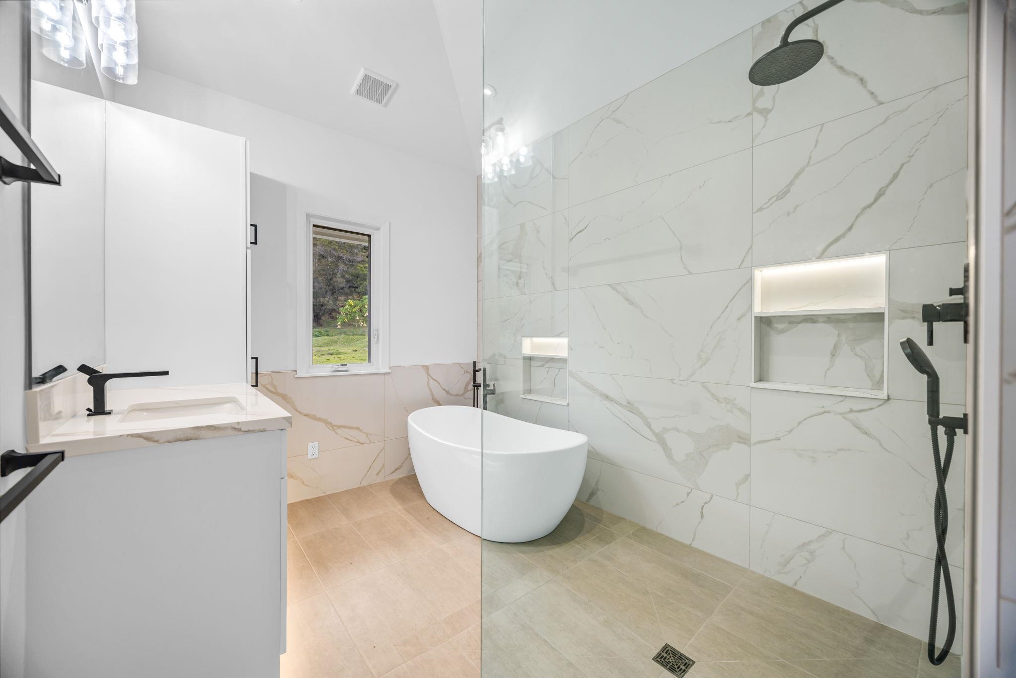 7733 Kula Highway Kula, HI 96790 - Photo 26 of 43 a bathroom with a double vanity sink mirror and bathtub