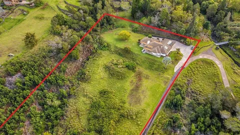 a view of swimming pool from a balcony