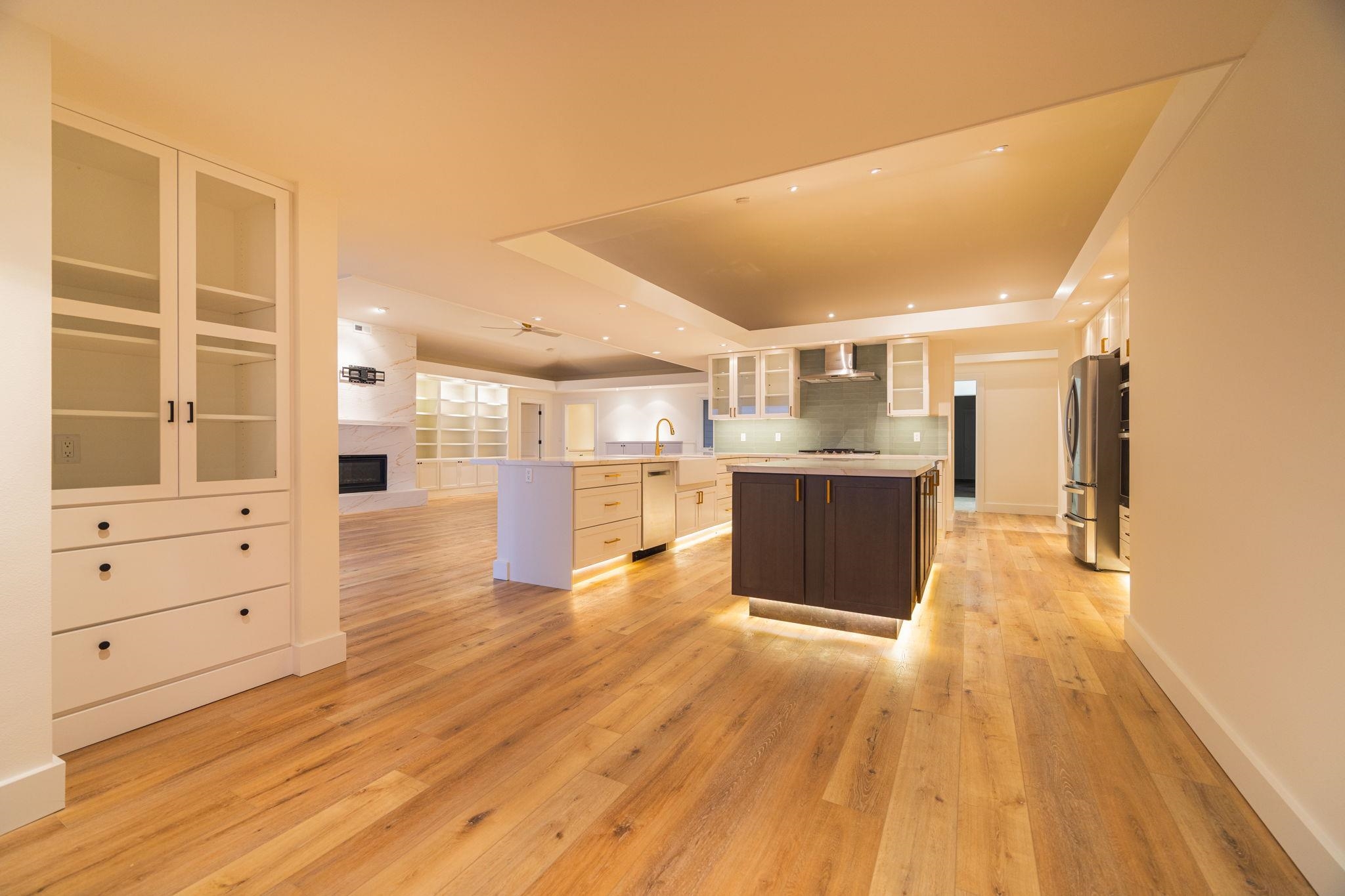 7733 Kula Highway Kula, HI 96790 - Photo 9 of 43 a view of a kitchen with wooden floor