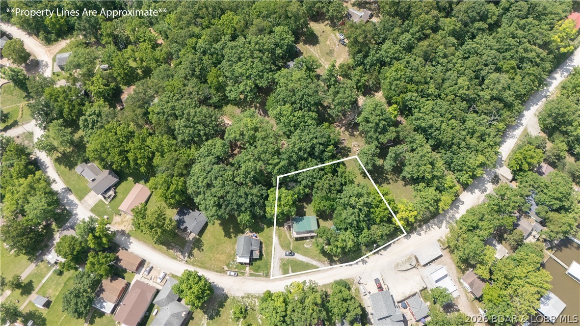 2486 Lick Creek Road Edwards, MO 65326 - Photo 3 of 39 double lot offering plenty of room to expand or ad