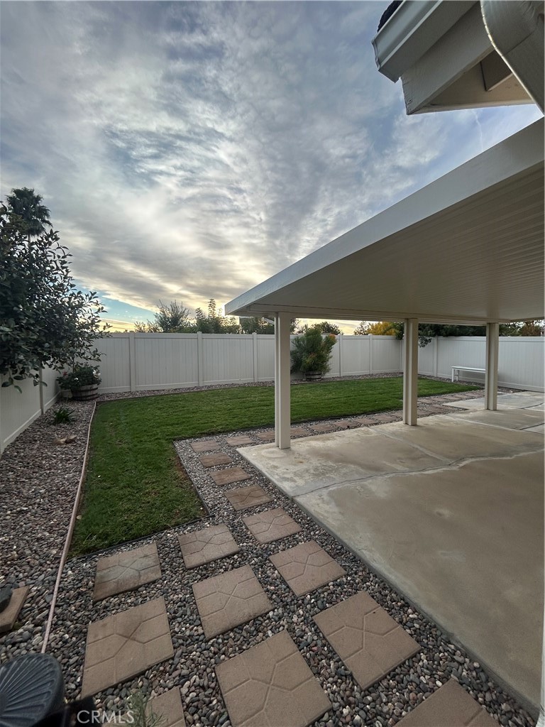 30433 Danube Court Temecula, CA 92591 - Photo 10 of 12 a backyard of a house with lots of green space
