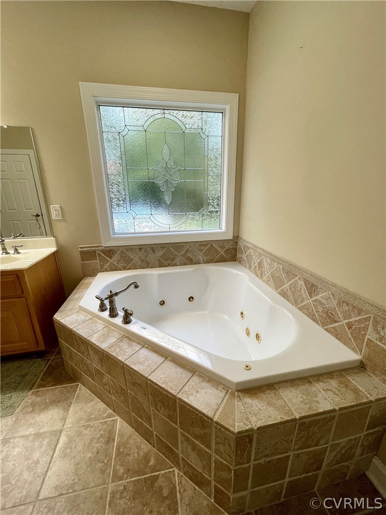 6153 Middle Road Prince George, VA 23875 - Photo 18 of 34 a bath tub sitting next to a window