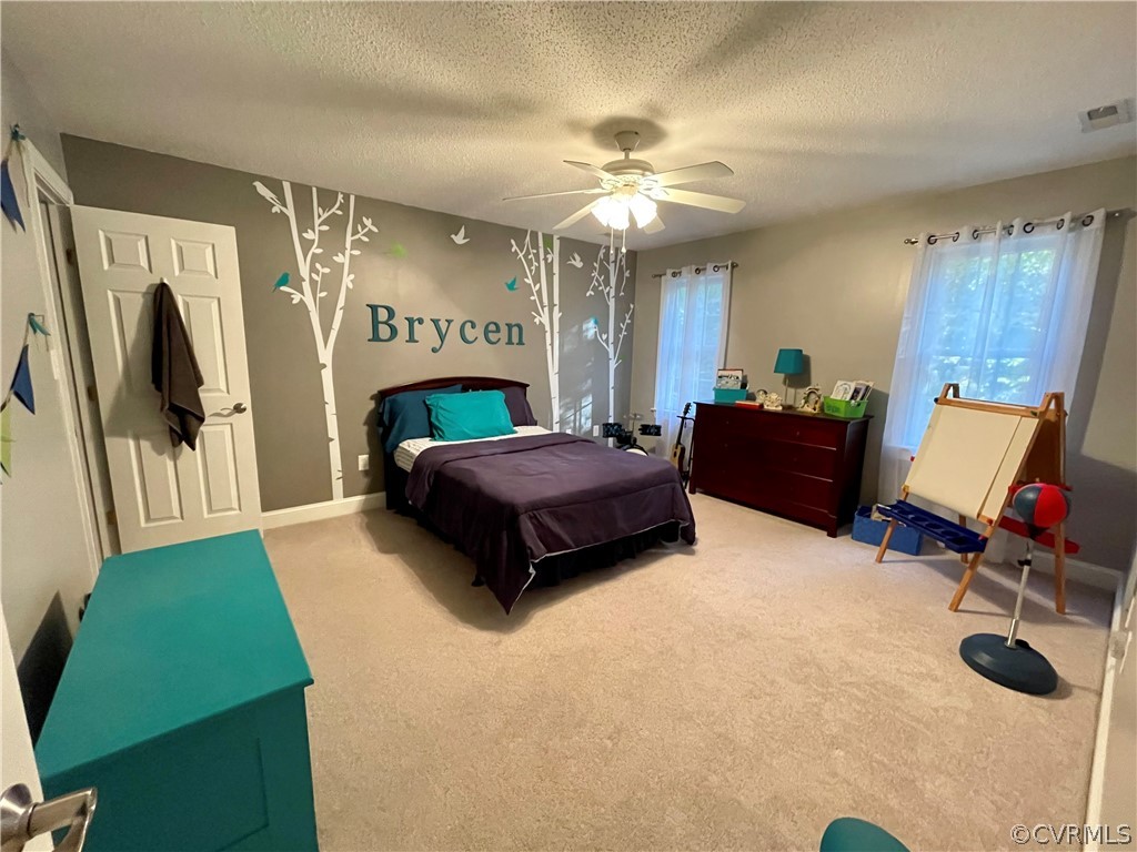 6153 Middle Road Prince George, VA 23875 - Photo 27 of 34 a living room with furniture and a flat screen tv