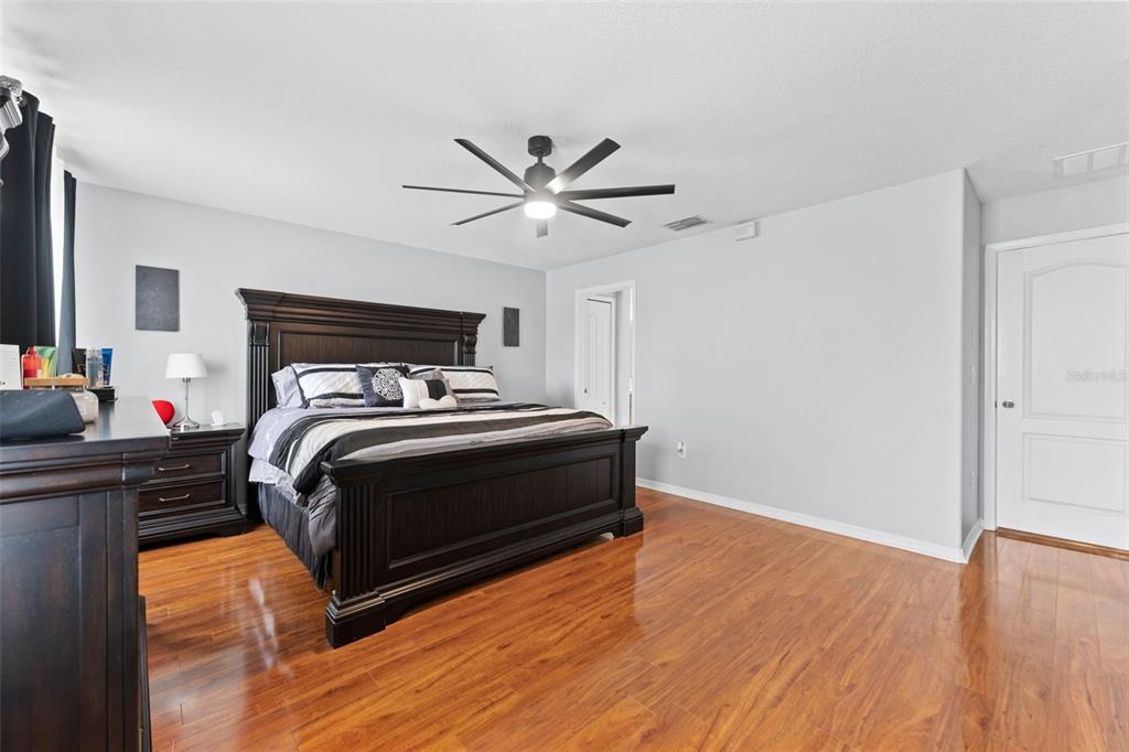 9641 Trumpet Vine Loop Trinity, FL 34655 - Photo 24 of 45 Master bedroom