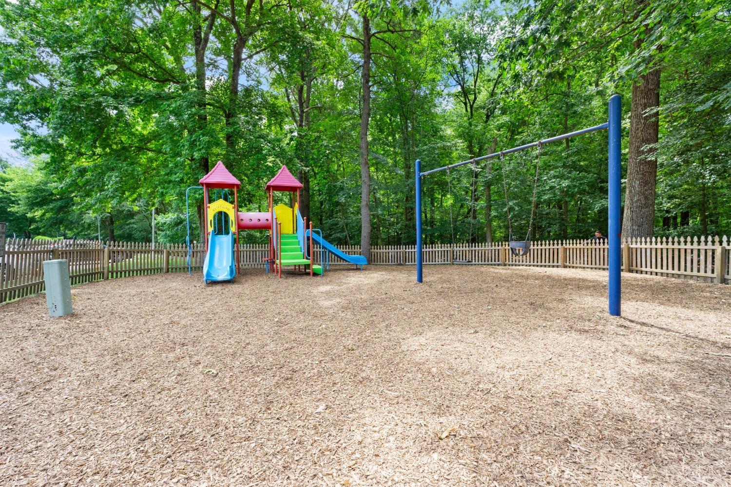 203 Raintree Court Helmetta, NJ 08828 - Photo 31 of 38 a view of outdoor space with playground and green space
