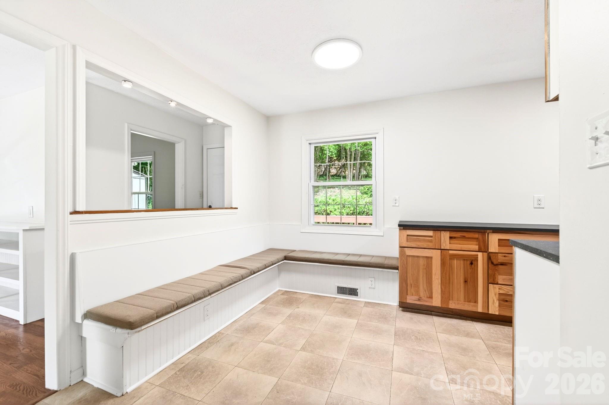 34 Wolfe Cove Road Asheville, NC 28804 - Photo 21 of 42 a view of an empty room with a window