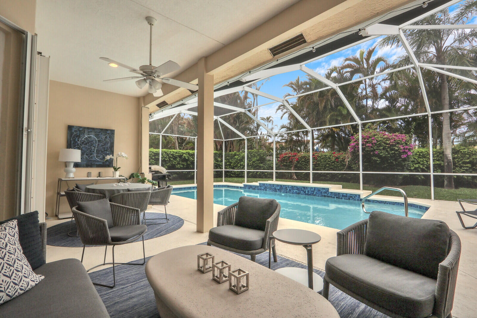 121 Olympus Way Jupiter, FL 33477 - Photo 8 of 13 a view of a livingroom with furniture and a window