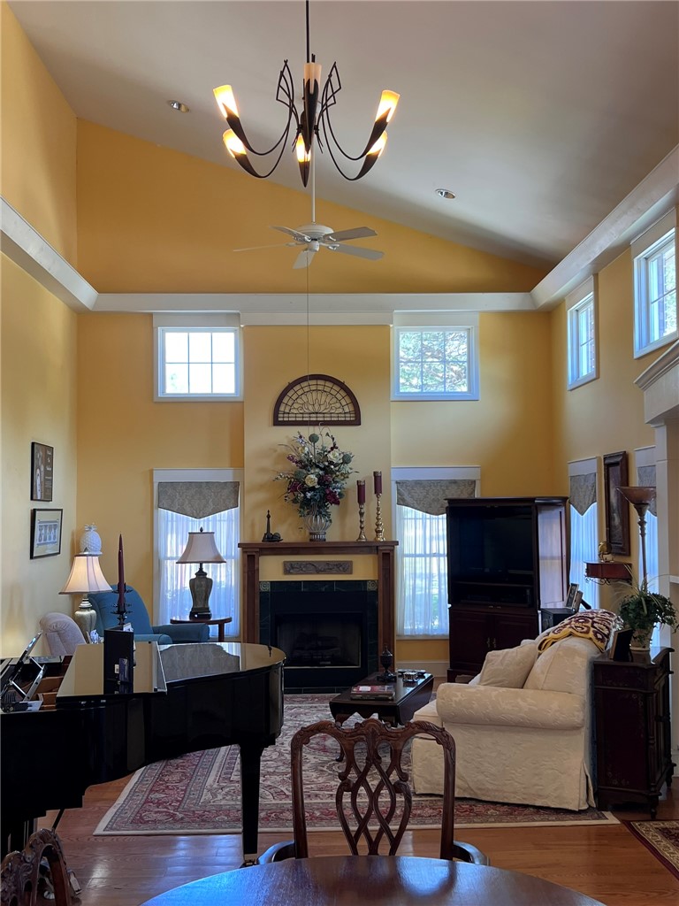 109 Buckingham Road Easley, SC 29640 - Photo 10 of 40 This bright living area features a warm ambiance, rich flooring, and abundant natural light.