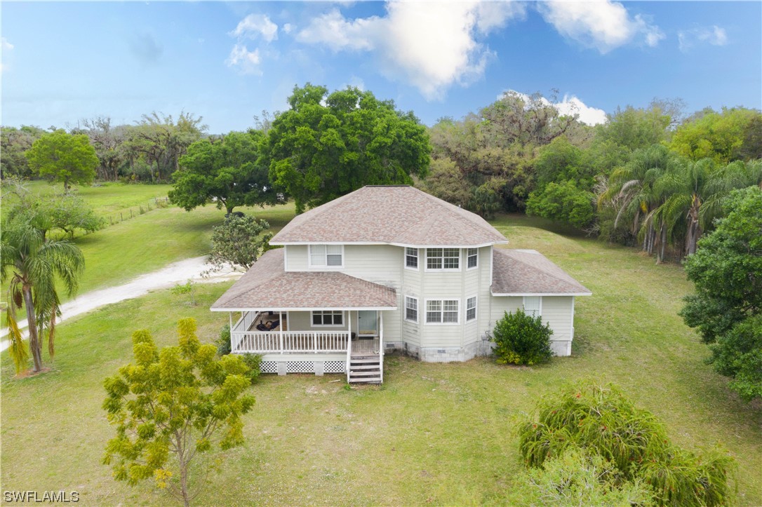 22561 Tuckahoe Road Alva, FL 33920 - Photo 3 of 32 an aerial view of a house