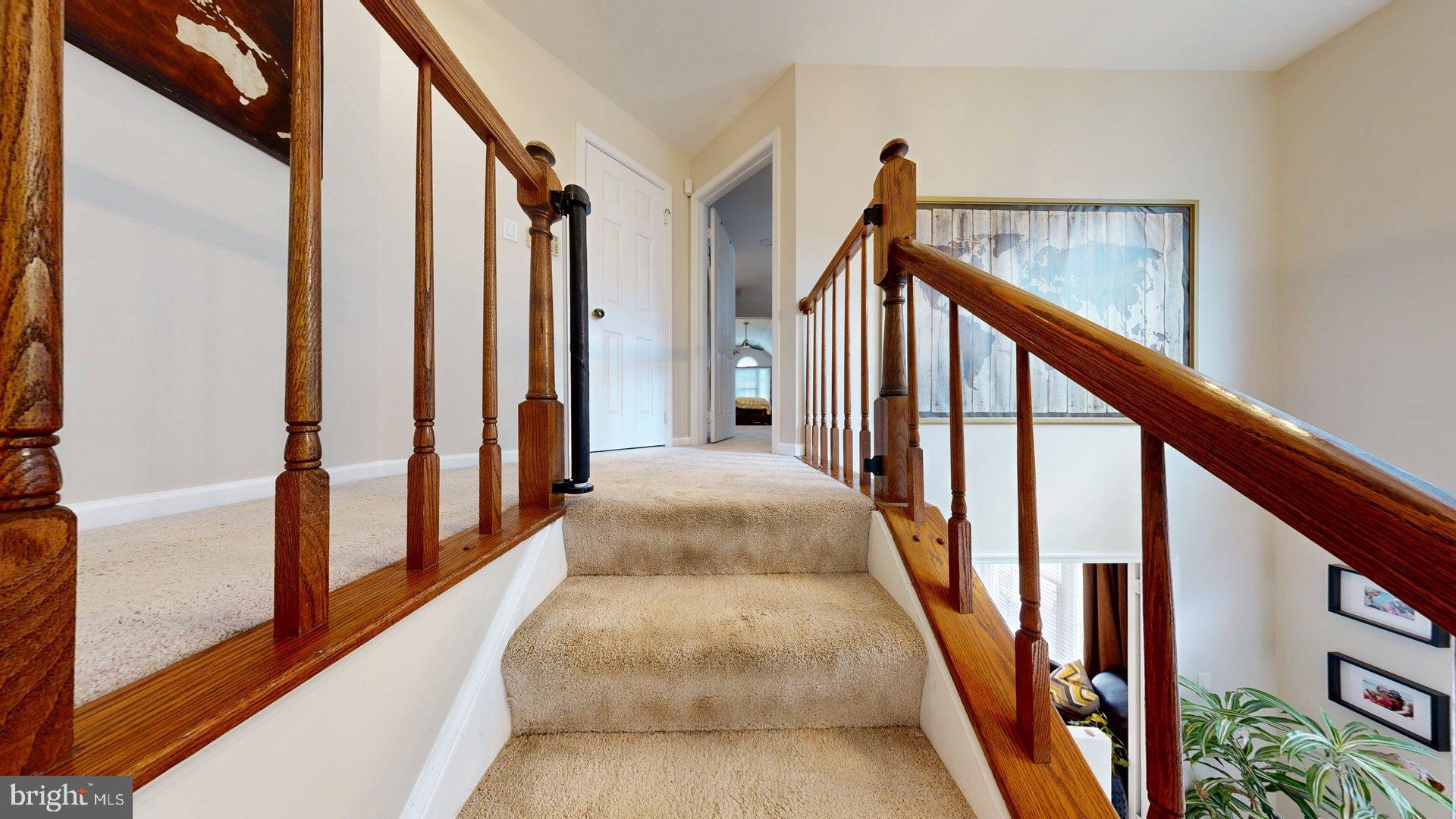 11901 Rustic Farm Court Germantown, MD 20874 - Photo 32 of 134 Inviting staircase to serene spaces.
