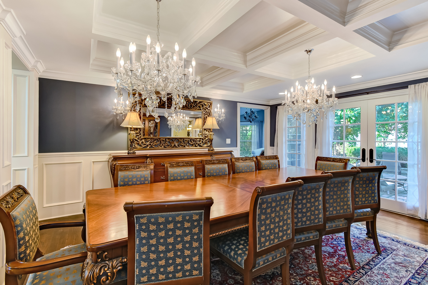 6116 South County Line Road Burr Ridge, IL 60527 - Photo 11 of 66 a view of a dining room with furniture a chandelier and large window