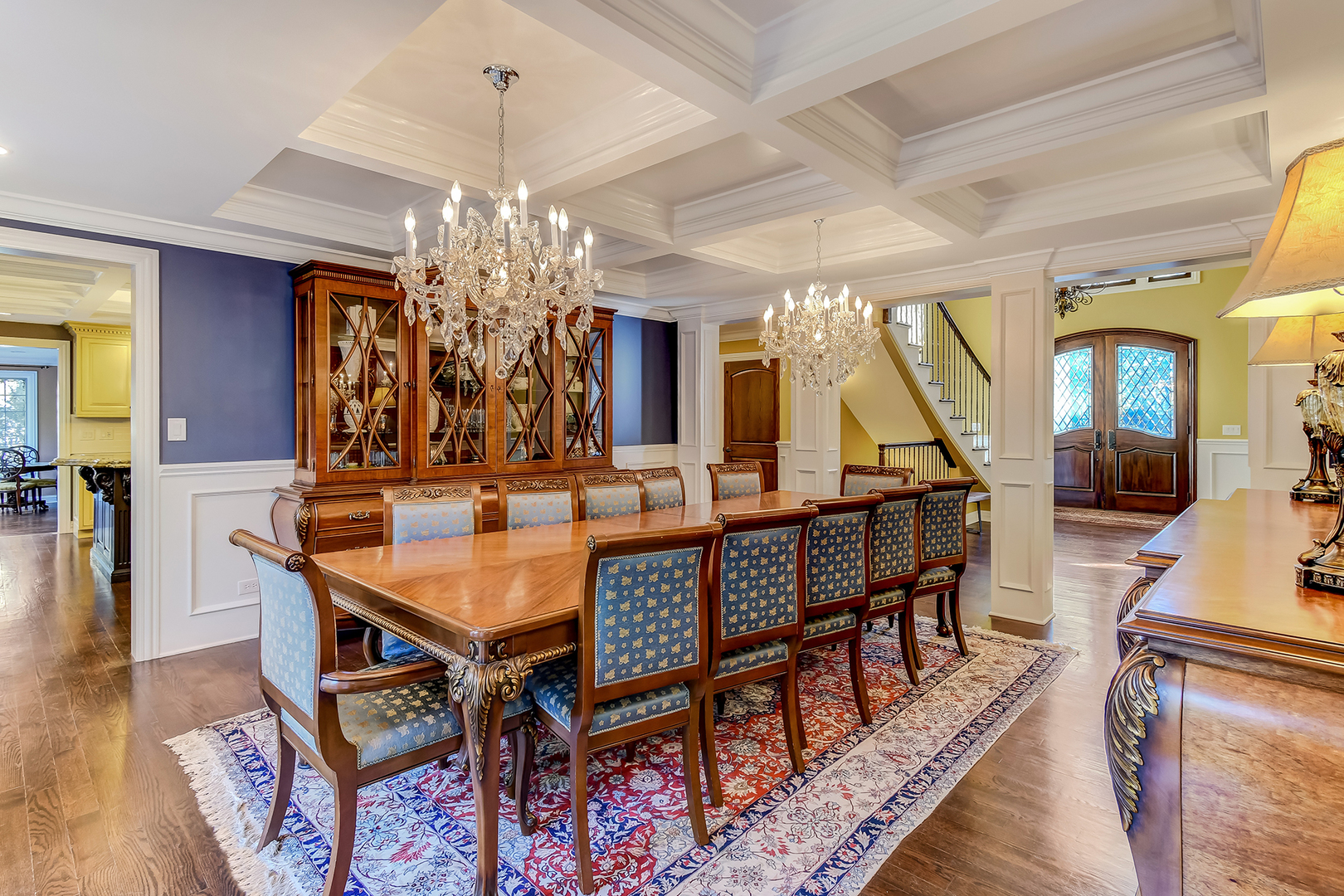 6116 South County Line Road Burr Ridge, IL 60527 - Photo 12 of 66 a view of a dining room with furniture and a chandelier