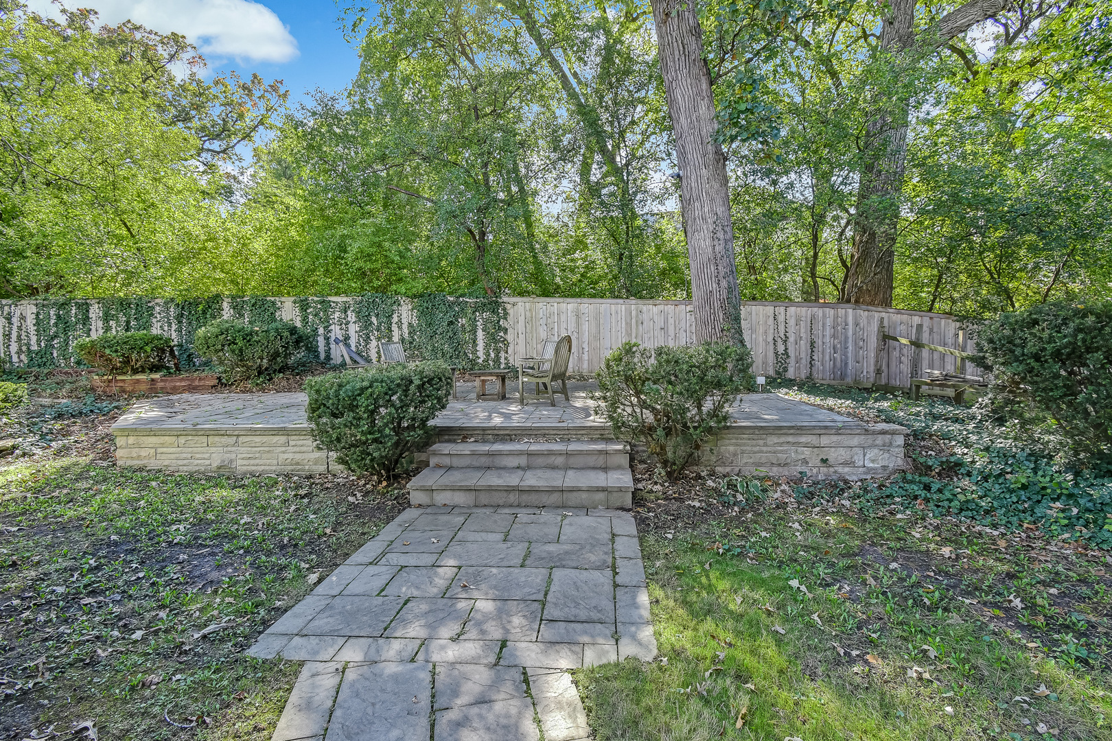6116 South County Line Road Burr Ridge, IL 60527 - Photo 53 of 66 a view of a pathway with a garden