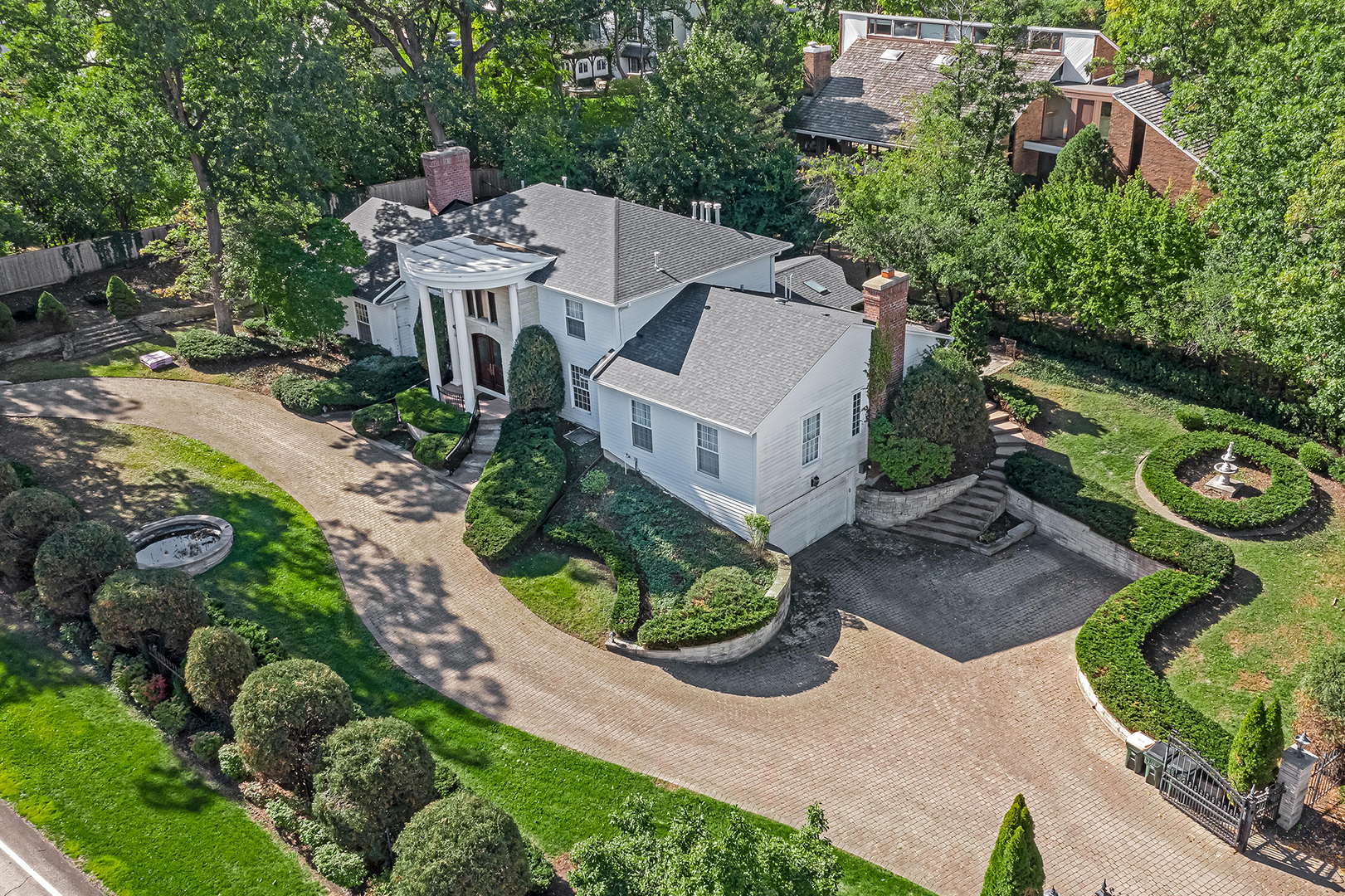 6116 South County Line Road Burr Ridge, IL 60527 - Photo 57 of 66 an aerial view of a house with garden space and street view