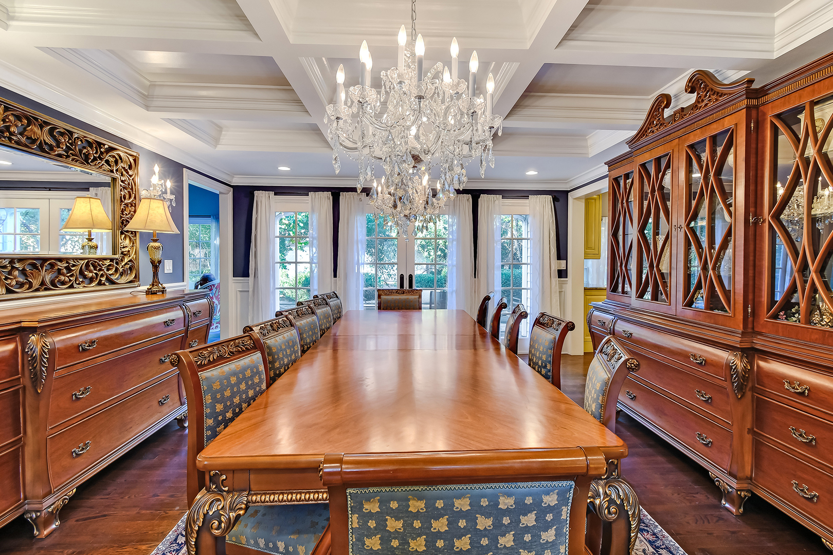 6116 South County Line Road Burr Ridge, IL 60527 - Photo 10 of 66 a dining table with chairs and wooden floor