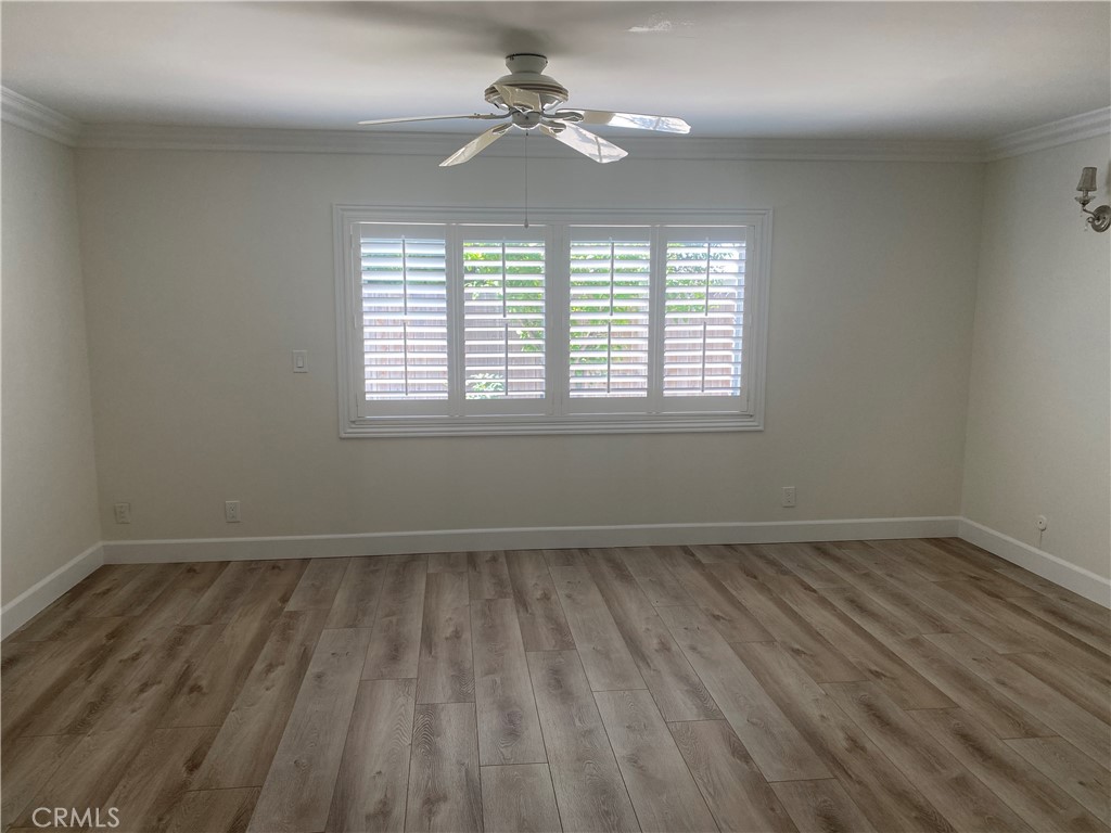 430 Buttonwood Drive Brea, CA 92821 - Photo 17 of 27 wooden floor in an empty room with a window