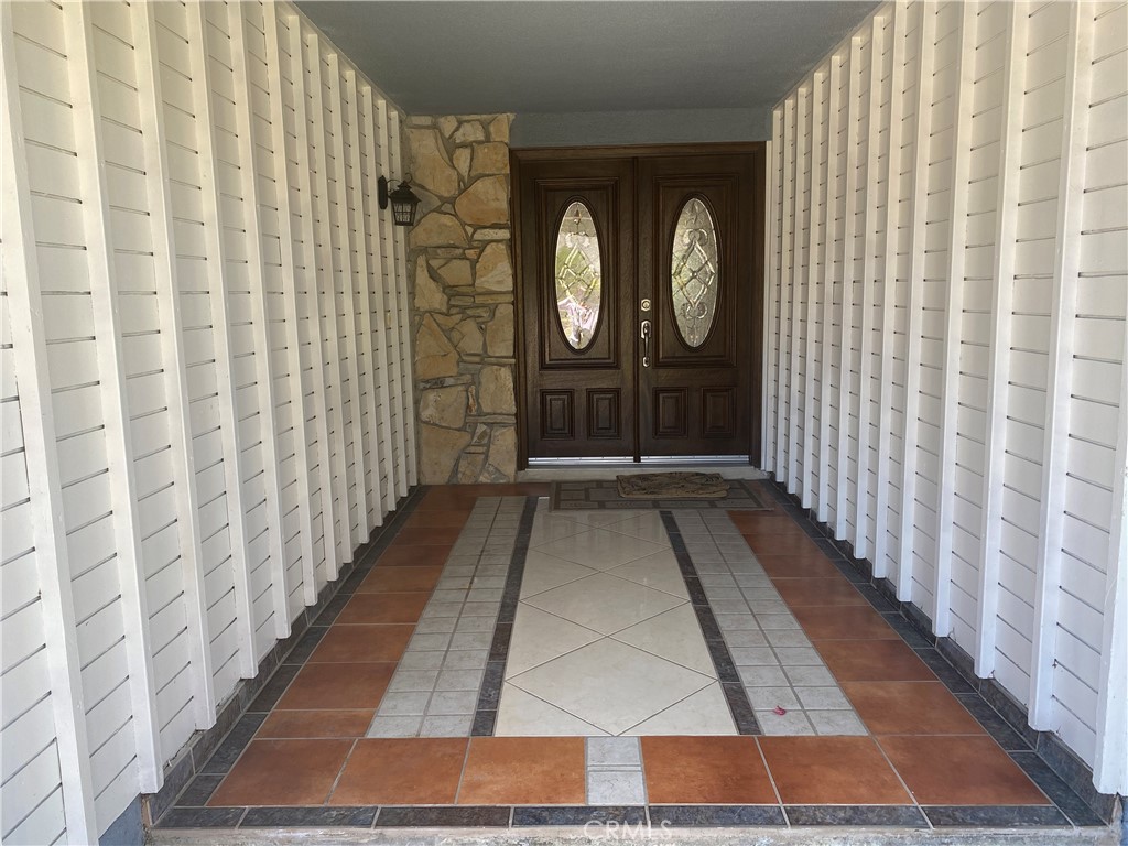 430 Buttonwood Drive Brea, CA 92821 - Photo 2 of 27 a view of a hallway with wooden floor