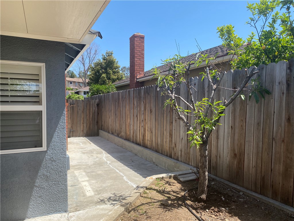 430 Buttonwood Drive Brea, CA 92821 - Photo 27 of 27 a wooden fence with trees in front of it
