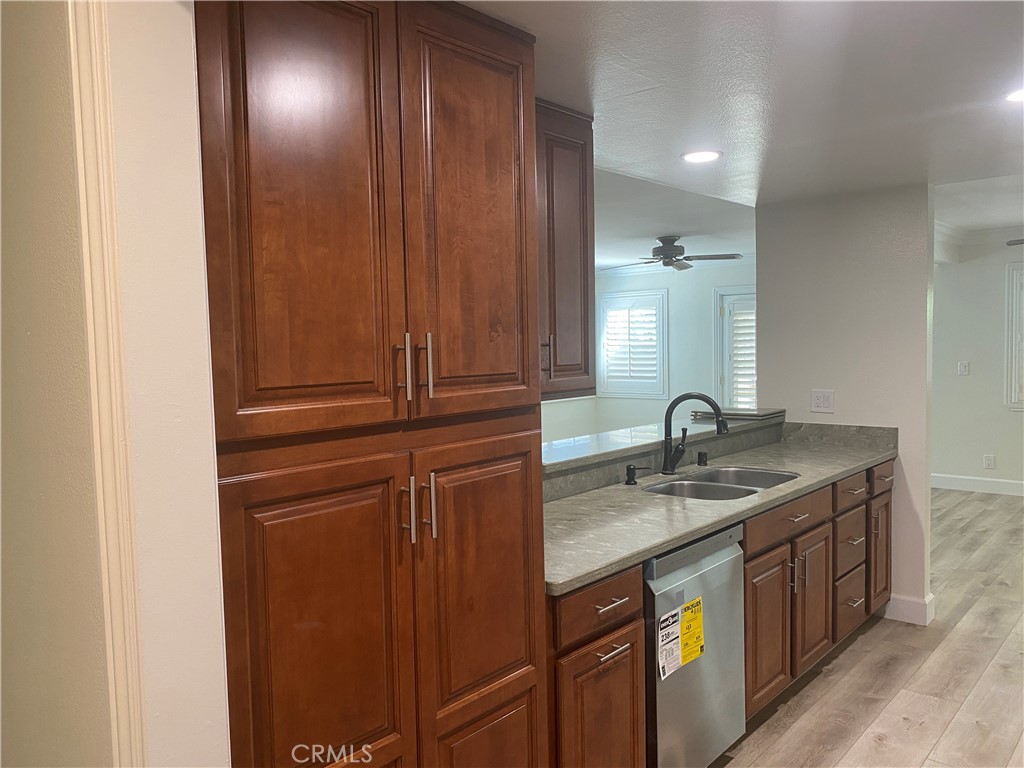 430 Buttonwood Drive Brea, CA 92821 - Photo 8 of 27 a bathroom with a sink and a mirror