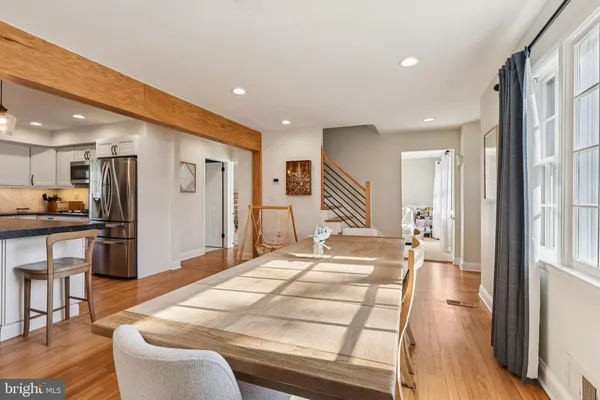 a very nice looking living room with a large window
