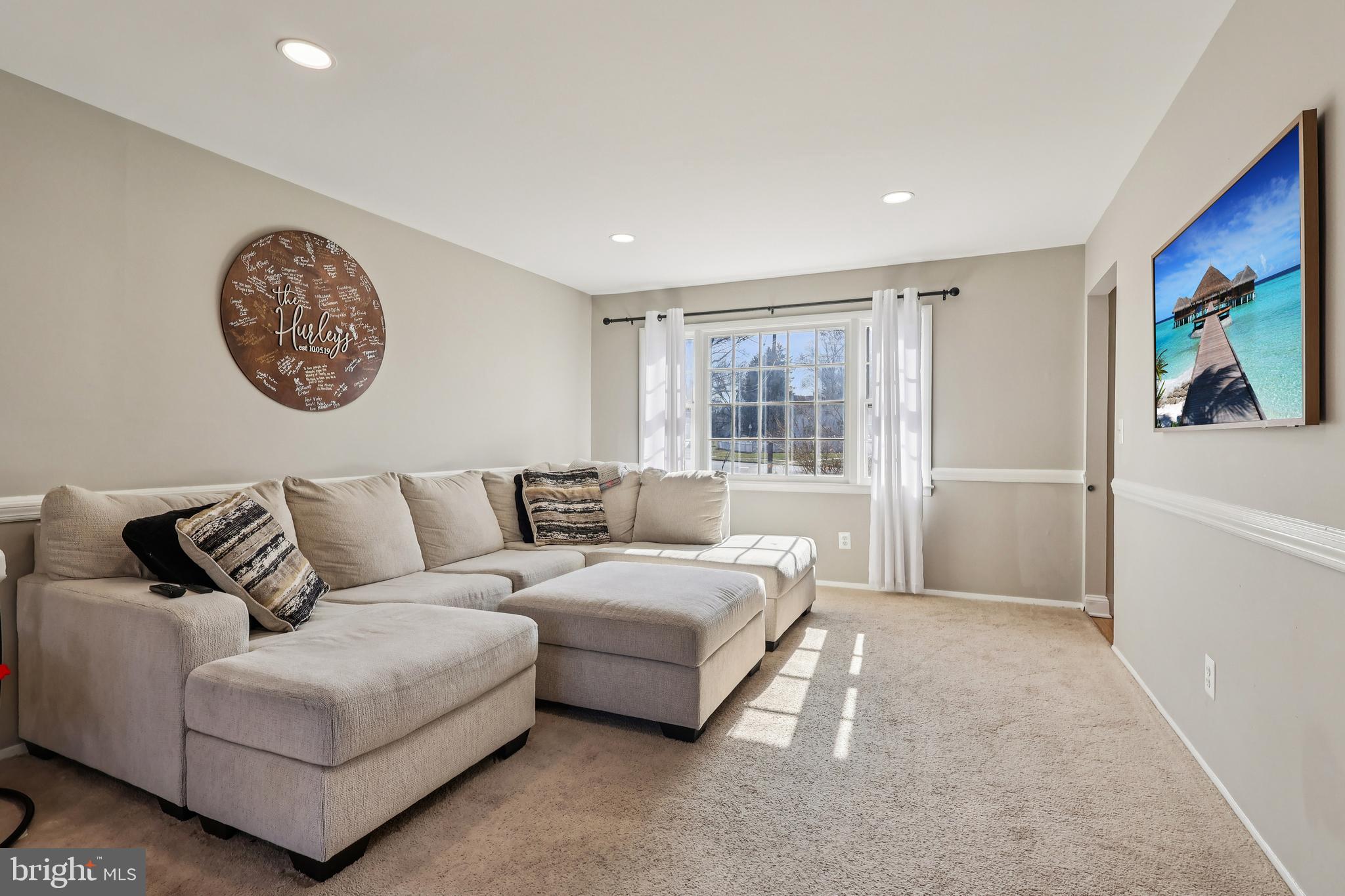 20 Corey Drive Ewing, NJ 08628 - Photo 21 of 52 a living room with a couch and a window