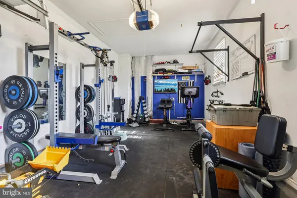 a view of a terrace with chairs and a fire pit