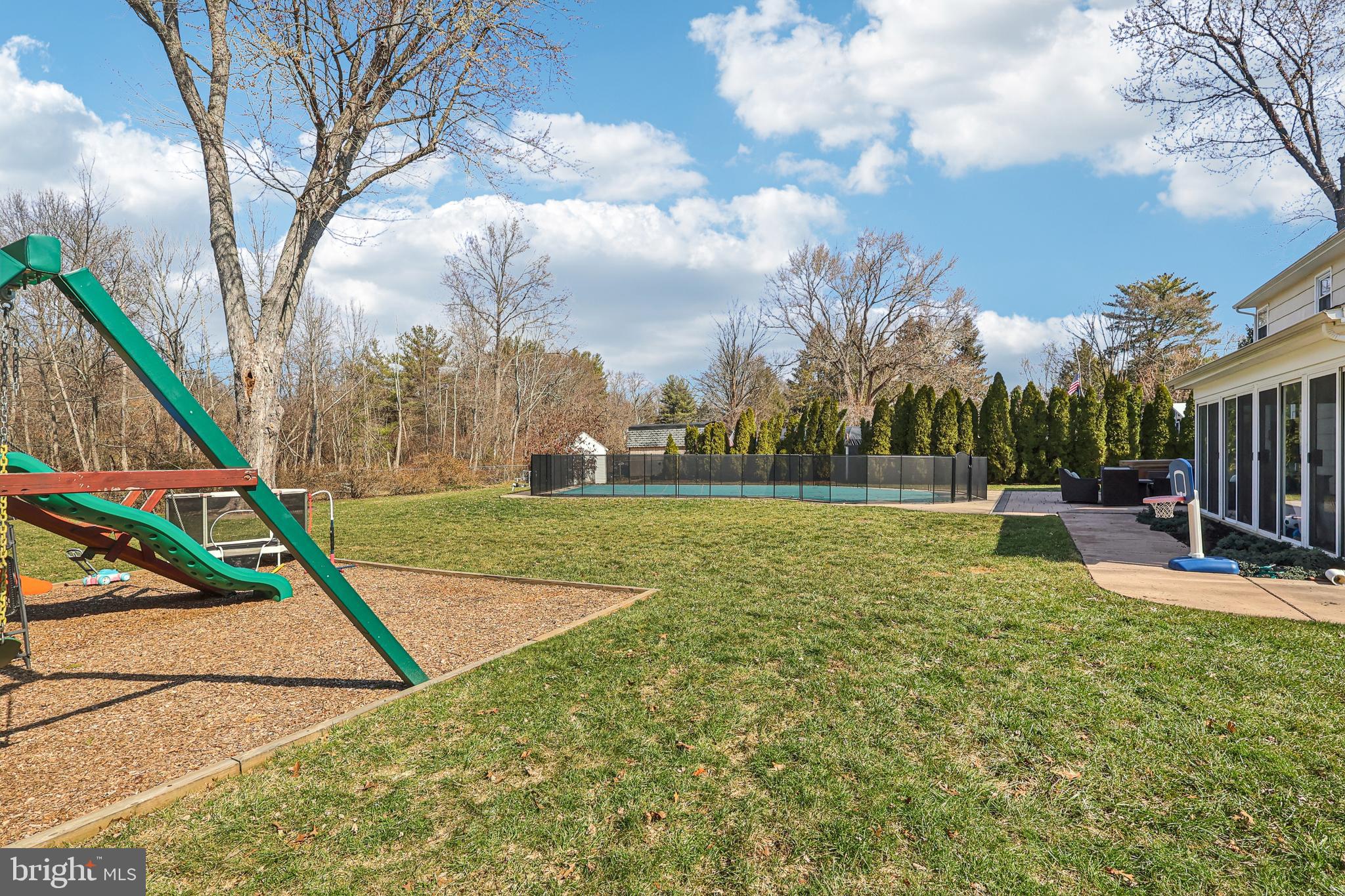 20 Corey Drive Ewing, NJ 08628 - Photo 46 of 52 a view of backyard with swimming pool and outdoor seating